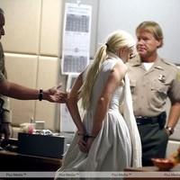 Lindsay Lohan at the Los Angeles Airport Courthouse being escorted